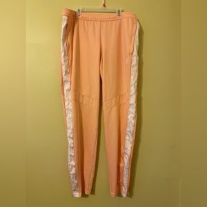 Coral Adidas track pants